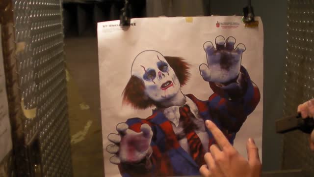 Zombie Clown vs. UZI