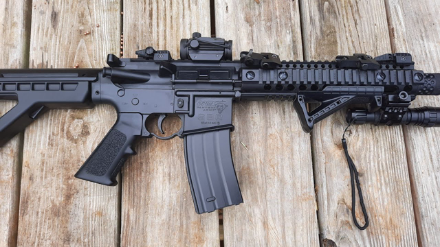 Shooting a Full Auto SBR, while shouldering. The Panther Arms DPMS  SBR.